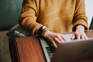 Writing on laptop