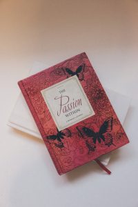 A red diary with passion written on it