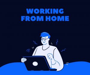 A MAN WORKING FROM HOME ON A LAPTOP